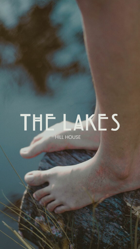 shows the words 'THE LAKES' written in Hillhouse Font - a bold & irregular display boho font with a photo of a man's feet by a lake's edge the background