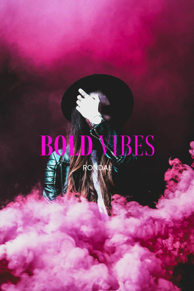 shows the words 'BOLD VIBES' written in shocking pink in RONDAL Font - a slim and tall display boho font with a gothic boho woman surrounded by pink smoke in the background