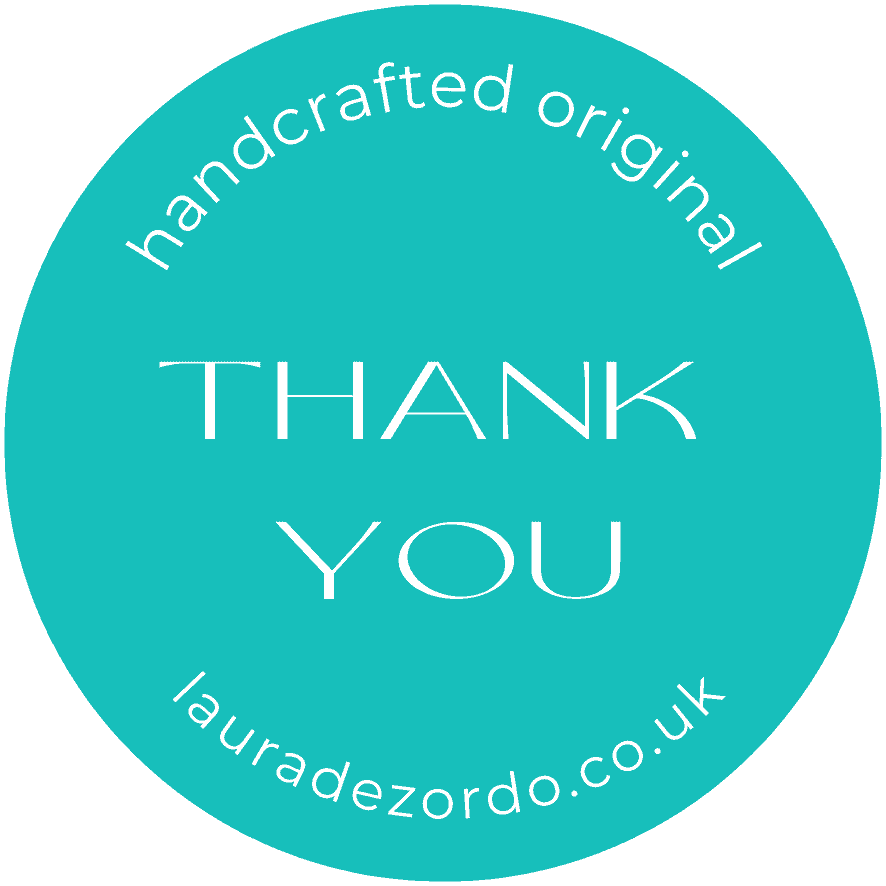 Packaging sticker in Tiffany blue reads handcrafted original, thank you, lauradezordo.co.uk